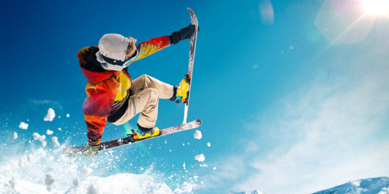 Skiing. Jumping skier. Extreme winter sports.
